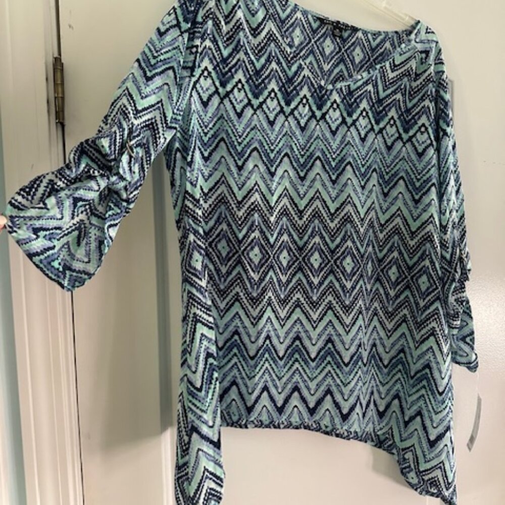 Light-weight, multi-colored roll-tab blouse
